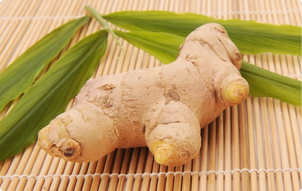 What does Ginger Essential oil help with?